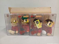Front view of four boxed bears