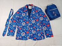 Full lot: blazer, tie and blue pouch