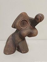 Front view of abstract pottery sculpture