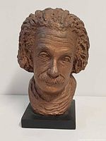 Front view of Einstein plaster bust on base