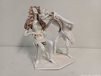 Full front view of Bencini ceramic sculpture showing both figures