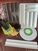 Group shot of all drawer organizers, Wilton turntable, trivet, baskets