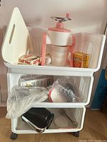 Overall lot showing cart with contents