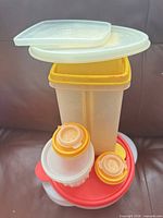 Overall view of stacked Tupperware pieces
