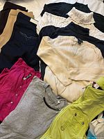 Overview of assorted tops and sweaters