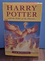 Front cover showing title, phoenix artwork, dust jacket
