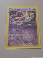 Front of Jirachi RC13 holo card in sleeve