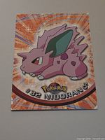 Front of Topps Nidoran ♂ holofoil card