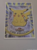Front view of holofoil Pikachu #25 card