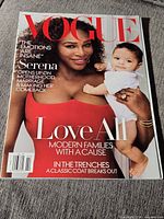 Front cover of Vogue February 2018 magazine featuring Serena Williams holding infant