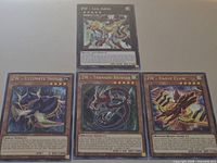 All four ZW cards displayed: Leo Arms, Ultimate Shield, Tornado Bringer, Eagle Claw