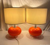 both lamps with shades illuminated