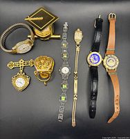 Group shot of all nine timepieces laid out