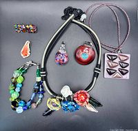 All jewelry pieces laid out showing variety and condition