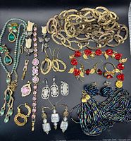 All jewelry pieces grouped on black background