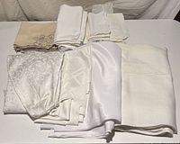 Overview of all folded linens on table