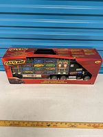 Front of boxed Fast Lane truck carry case set