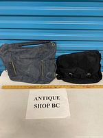 Front view of both handbags side by side