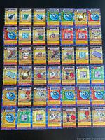 All 42 cards laid out in grid, showing front artwork and variety