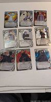 Nine Naruto CCG cards laid out 3×3
