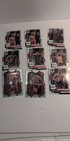 Nine UFC trading cards laid out in three rows