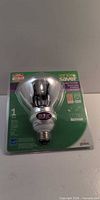 Front of sealed Globe Eco Saver LED BR30 flood bulb packaging