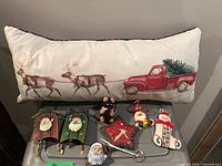 All items overview: pillow and six ornaments