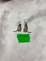 Both cat earrings front view with lot tag