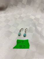 Front view of both earrings showing larimar stones and leverback style
