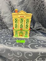 Front view of ceramic bank building showing facade, windows, and decorations