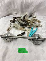 Pulley front with pile of clothespins