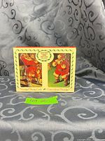 Front of boxed playing cards showing two Santa designs and 1993 date