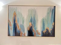 Front view of abstract canvas wall art mounted on wall