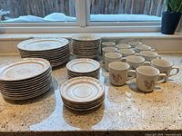 All pieces grouped on countertop showing quantities and pattern