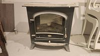 Front view of black Dimplex electric stove heater