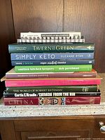 All ten books stacked showing full spines