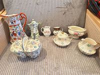 Group shot of all eight porcelain pieces