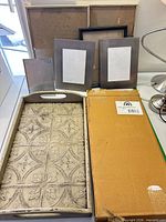 All items grouped: tray, frames, boxed candelabra