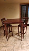 Table with two stools, full set view