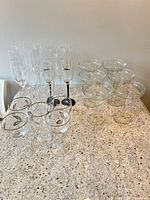 Group view showing flutes, goblets and coupes on countertop