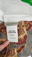 Close-up of Pottery Barn label and fabric tag