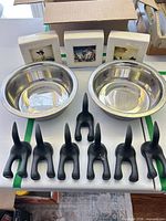 Overview showing 3 tiles, 2 bowls, 7 hooks