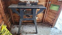 Full view of Vermont American router table stand in shed