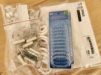 All items together in plastic bag including loose hooks, white rings, sealed Splash pack, IKEA garment bag pack