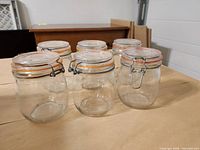 Front view of all six glass canisters