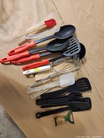 Group shot of all twelve utensils arranged on surface