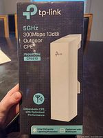 Front of TP-Link CPE510 box showing model, frequency, speed, antenna gain
