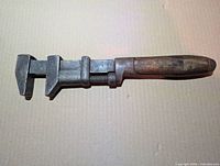 Full view of the 15-inch COES wood-handled monkey wrench