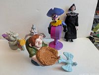 Five character figures including Quasimodo, two gargoyles, Clopin and Frollo
