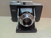 Front view of Adox Golf 63 with bellows extended showing lens details